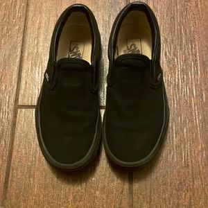 Black kids slip on Vans size 13.5